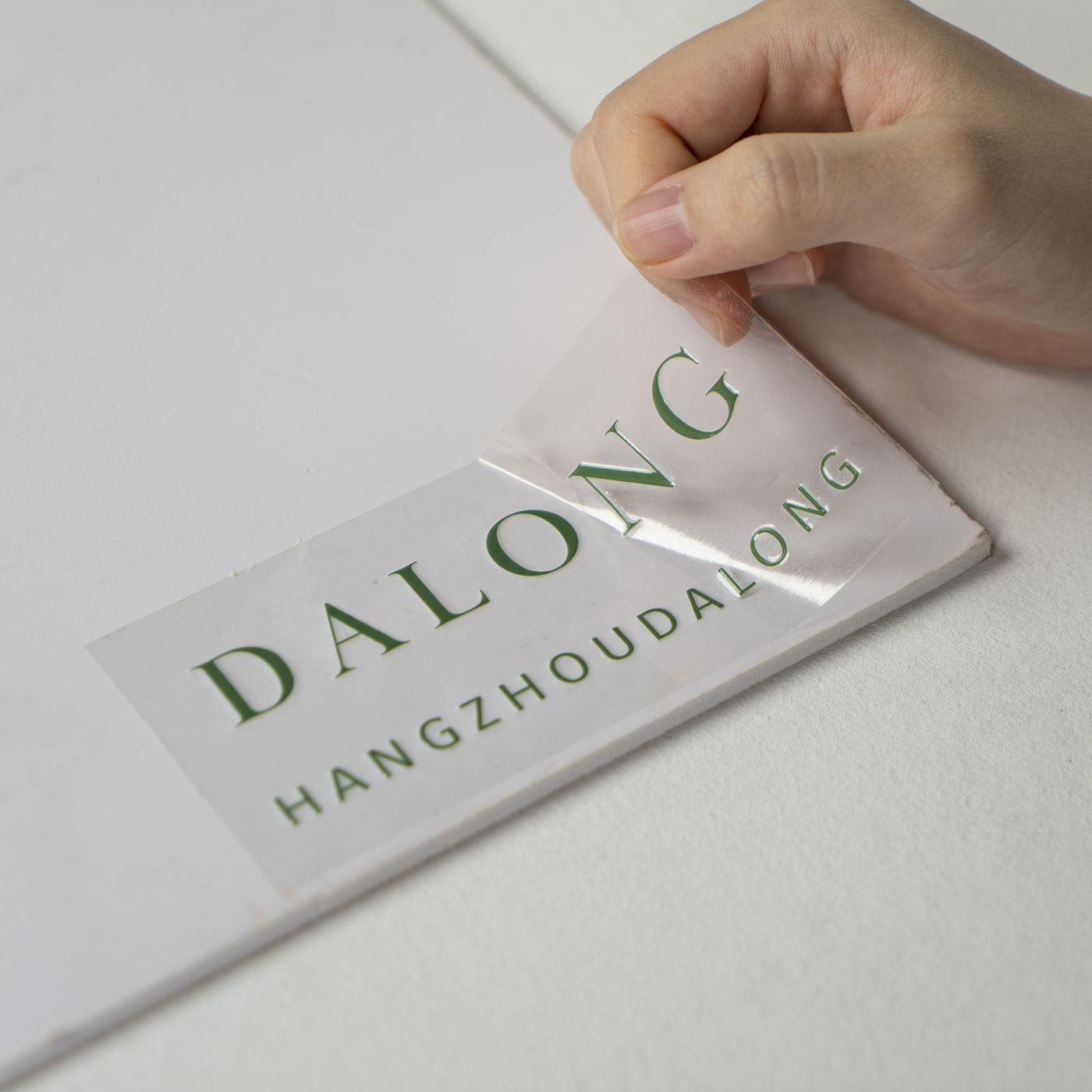 Transparent logo sticker